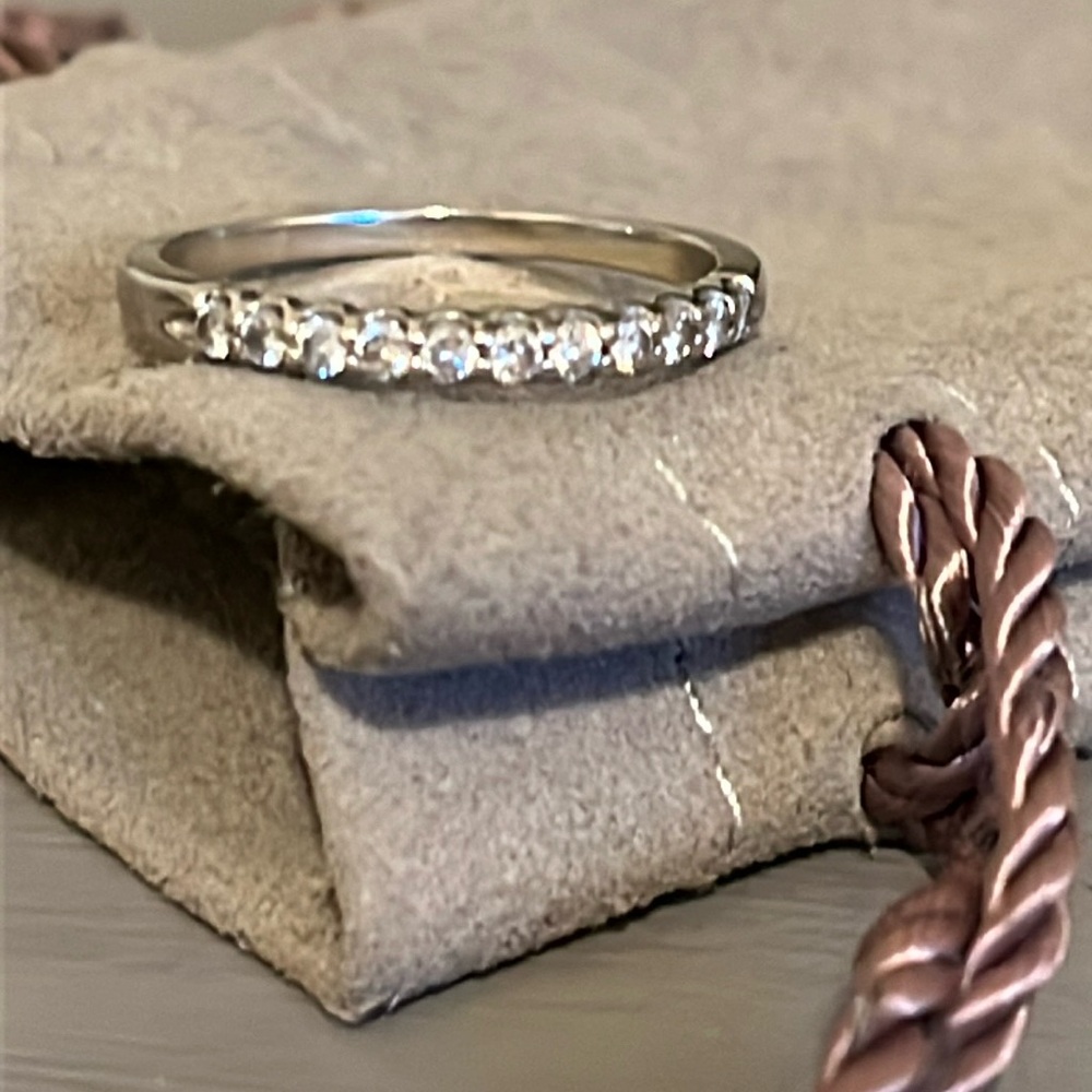 Diamond wedding band women’s size 7 purchased at Macy’s 14K white gold